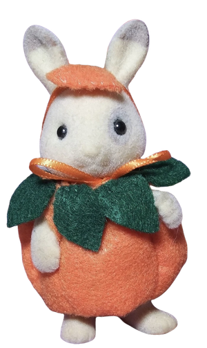 bunny dressed as a pumpkin